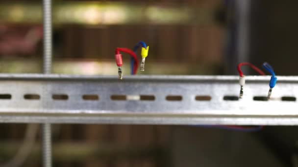 Slider shot of a blank metal DIN rails in workshop laboratory — Stock Video