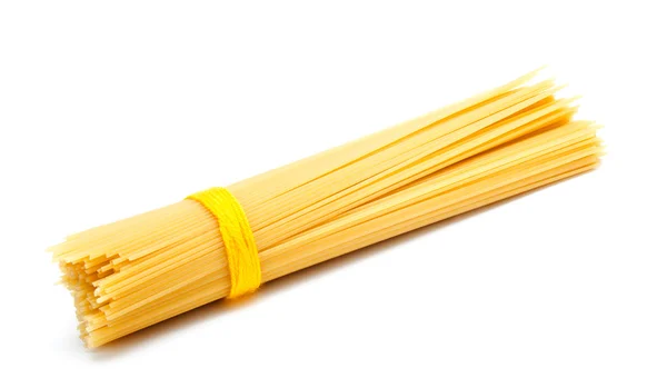 Nevařené italské špagety izolované — Stock fotografie