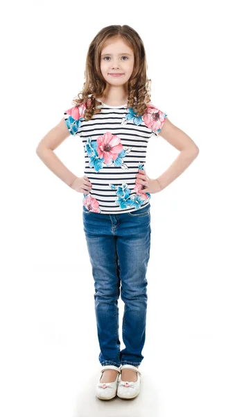 Söt leende liten flicka i jeans isolerade — Stockfoto