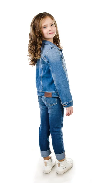 Bonito sorridente menina em jeans isolado — Fotografia de Stock