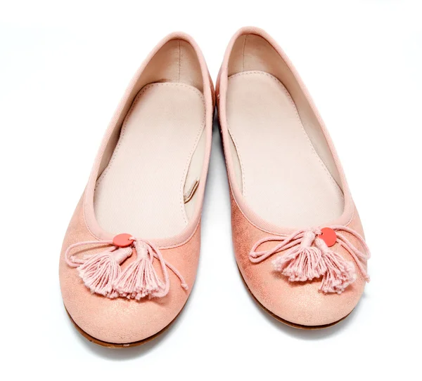 Девочка розовые туфли изолированы на белом — стоковое фото