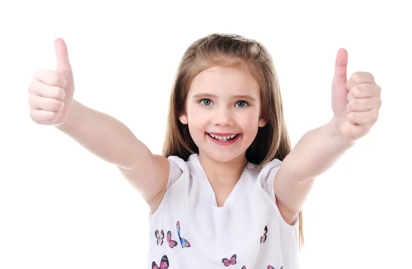 Милая улыбающаяся маленькая девочка с двумя пальцами вверх — стоковое фото