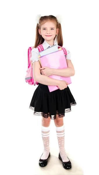 Portrait of smiling schoolgirl in uniform with backpack Royalty Free Stock Images