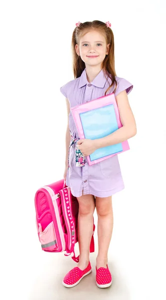 Portrait of smiling schoolgirl with books and backpack — Stock Photo, Image