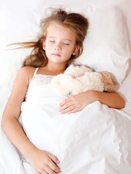 Adorable little girl sleeping with toy — Stock Photo, Image