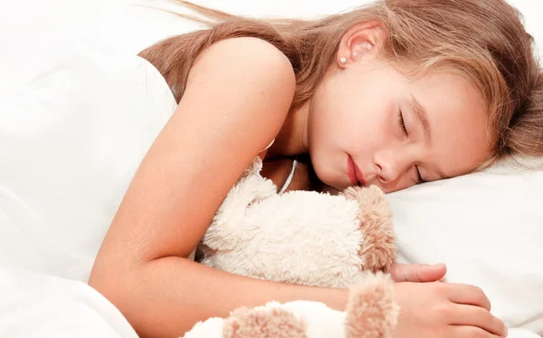 Adorable little girl sleeping with toy — Stock Photo, Image