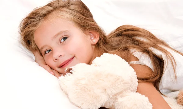 Adorável sorrindo menina acordou — Fotografia de Stock