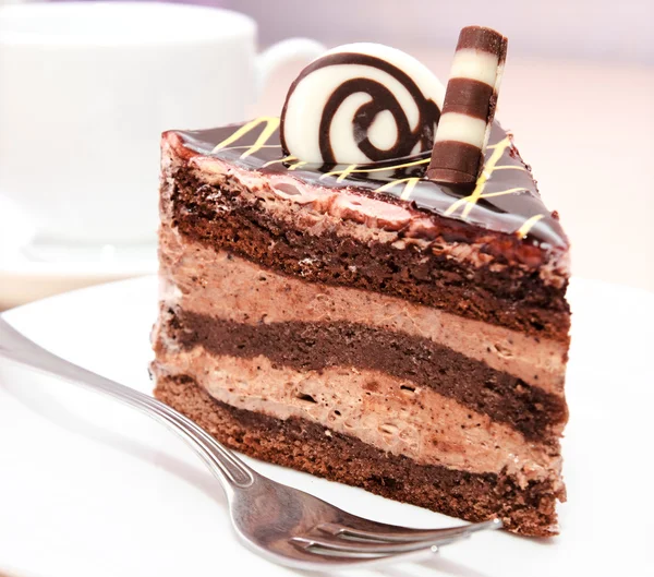 Piece of chocolate cake on a plate — Stock Photo, Image