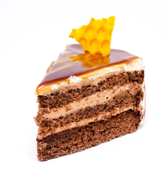 Piece of honey cake isolated on a white