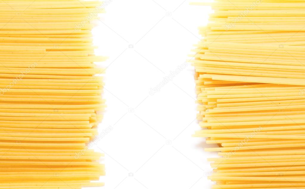 Uncooked Italian spaghetti isolated on a white