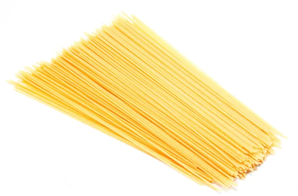 Espaguetis italianos sin cocer aislados —  Fotos de Stock