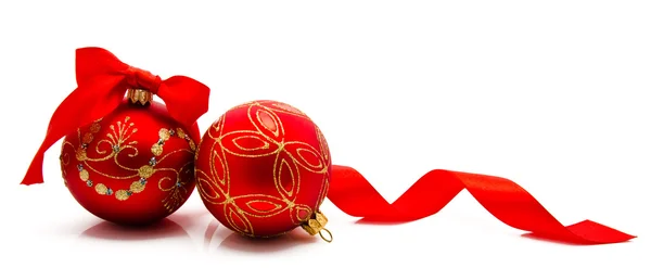 Two red christmas balls with ribbon isolated on a white — Stock Photo, Image