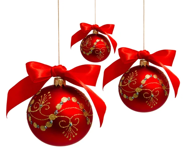 Red christmas balls with ribbon isolated on a white — Stock Photo, Image