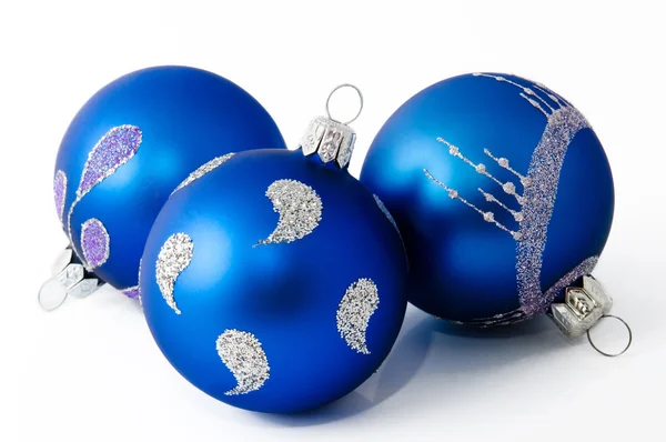 Three blue christmas balls isolated on a white — Stock Photo, Image