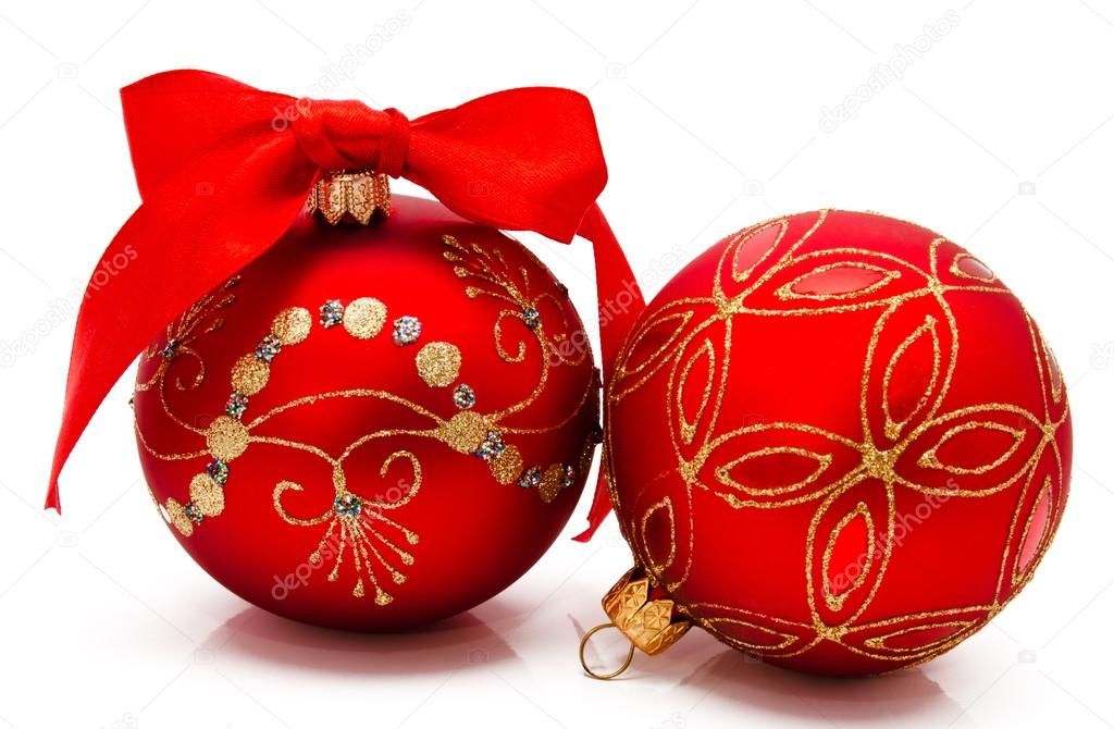 Two red christmas balls with ribbon isolated on a white