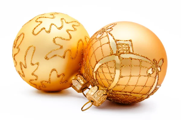 Two golden christmas balls isolated — Stock Photo, Image