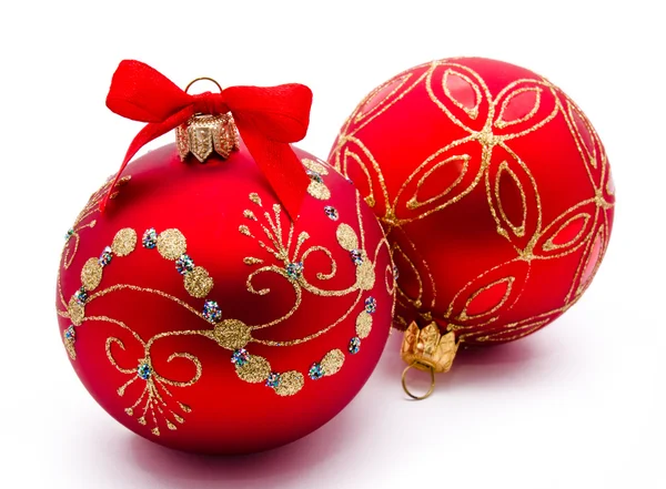 Two red christmas balls with ribbon isolated — Stock Photo, Image