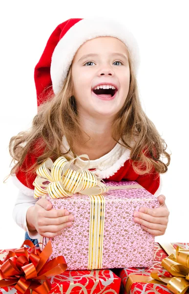 Glücklich niedliches kleines Mädchen mit Weihnachtsgeschenk — Stockfoto