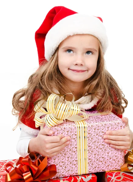 Glücklich niedliches kleines Mädchen mit Weihnachtsgeschenkboxen — Stockfoto