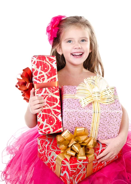 Happy bedårande liten flicka med jul gåva lådor — Stockfoto