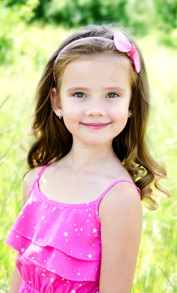 Portrait of adorable smiling little girl — Stock Photo, Image