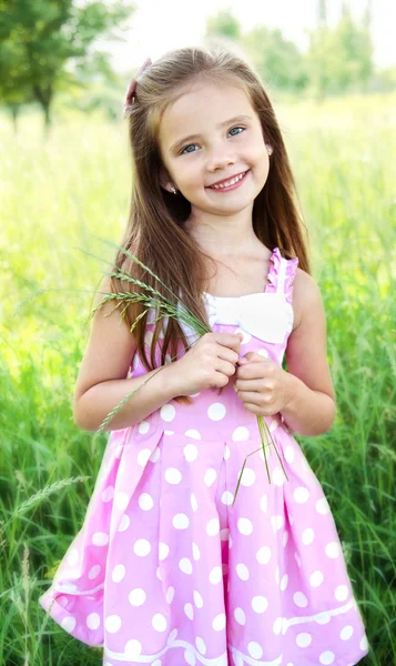 Portrait of adorable smiling little girl — Stock Photo, Image