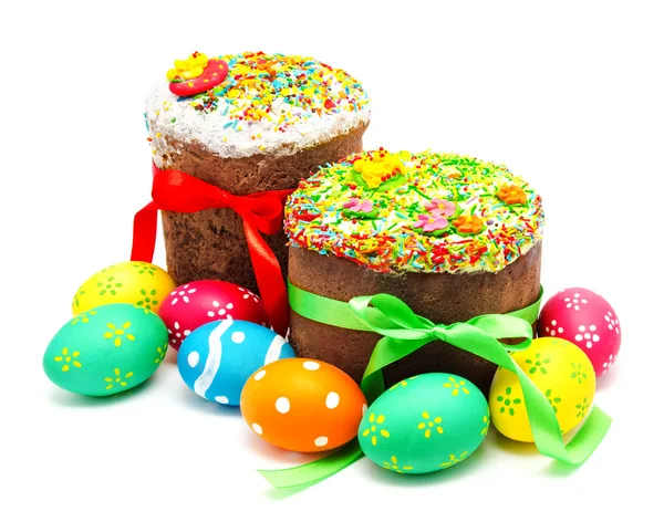 Two decorated easter cakes and eggs isolated Royalty Free Stock Images