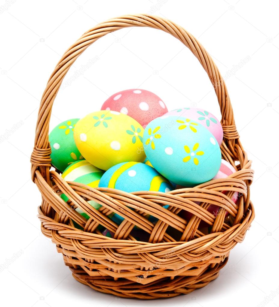 Colorful handmade easter eggs in the basket isolated — Stock Photo © svetamart 64671789