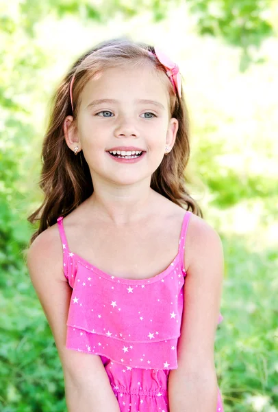 Portrait of adorable smiling little girl — Stock Photo, Image