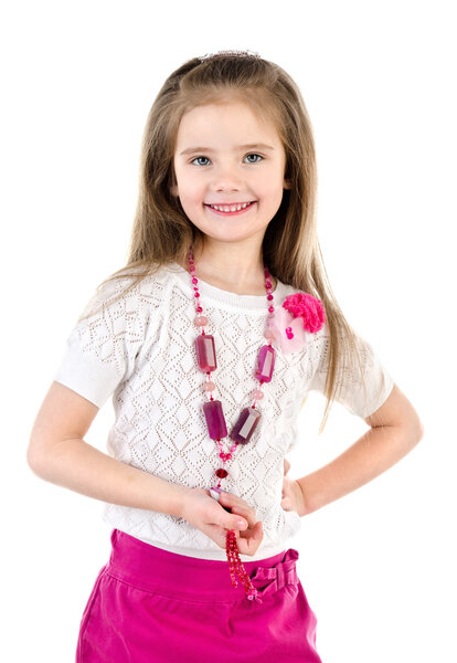 Smiling adorable little girl in skirt with beads isolated