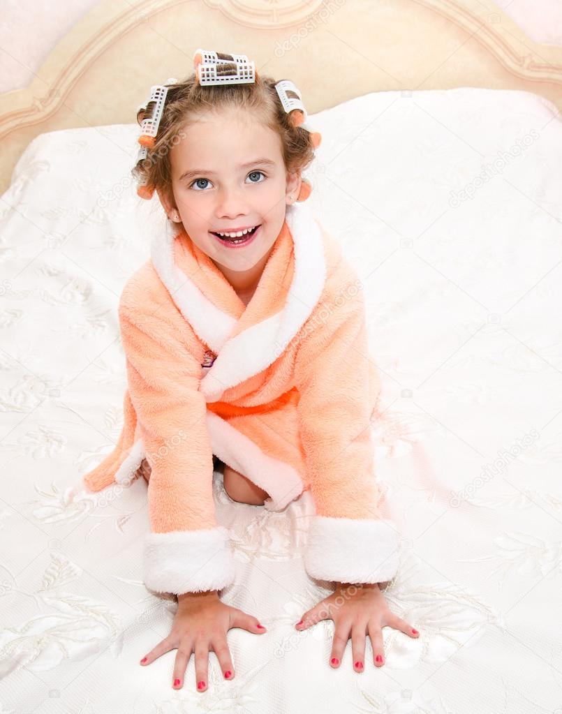 Happy Funny Little Girl With Manicure And Hair Curlers Stock