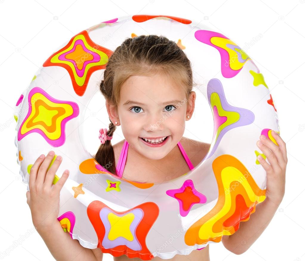 Cute smiling little girl with rubber ring