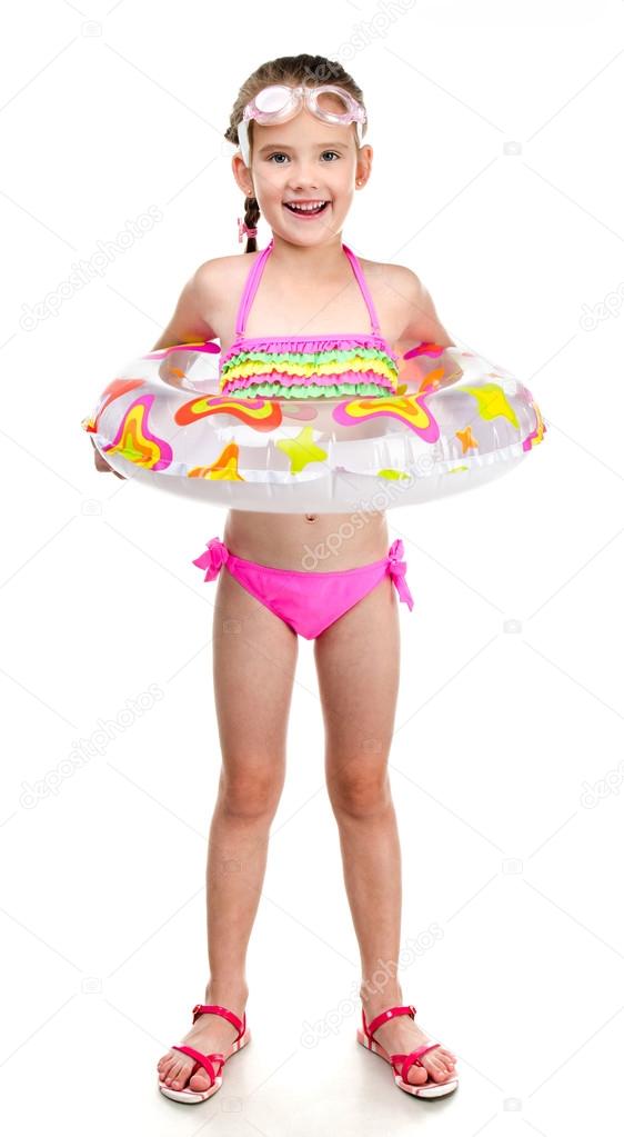 Cute smiling little girl in swimsuit