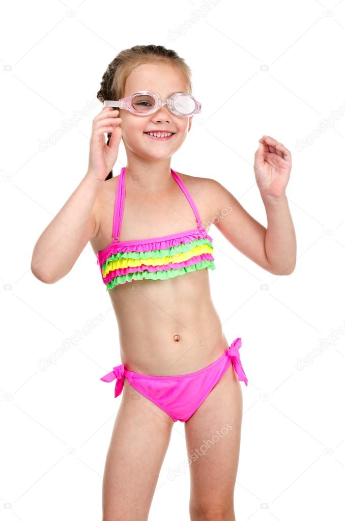 Cute happy little girl in swimsuit