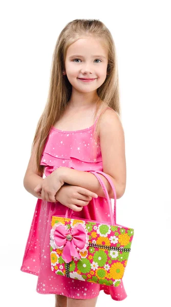 Portrait of smiling cute little girl with bag — Stock Photo, Image