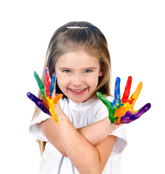 Glad söt liten flicka med färgglada målade händer Stockbild