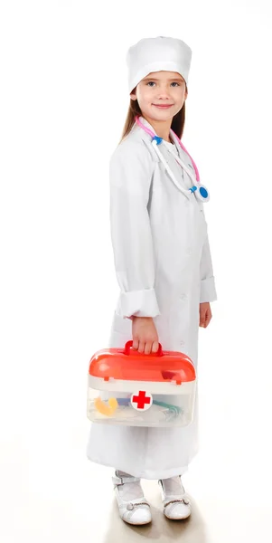 Adorable niña sonriente jugando al médico — Foto de Stock