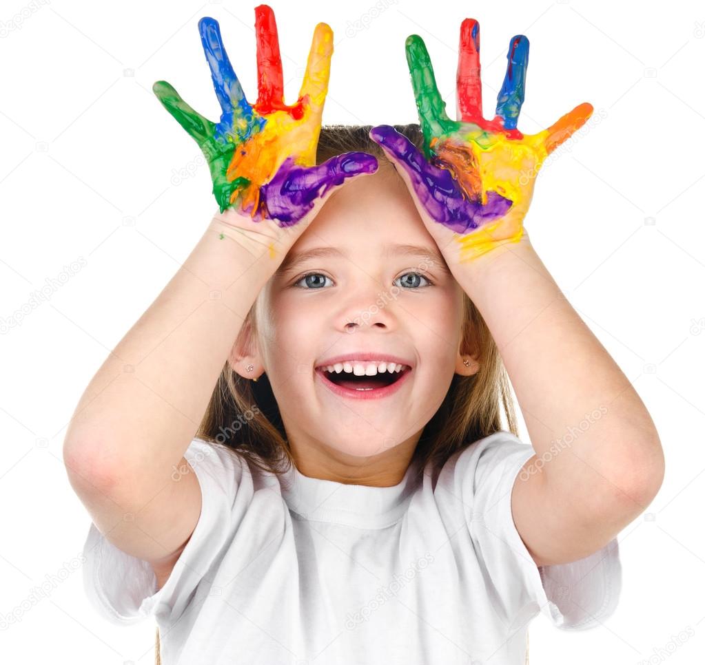 Happy cute little girl with colorful painted hands 