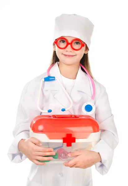 Adorable niña sonriente jugando al médico — Foto de Stock