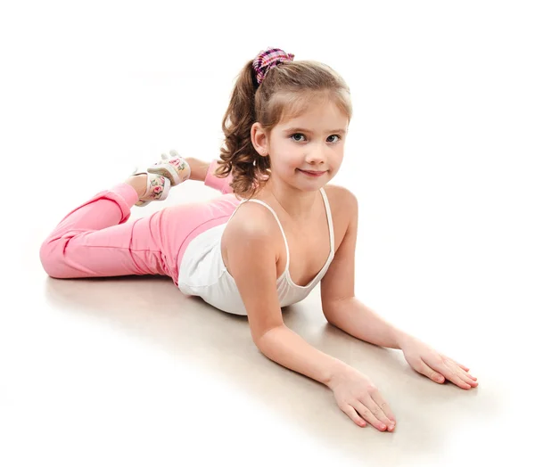 Cute little girl doing gymnastic exercise — Stock Photo, Image