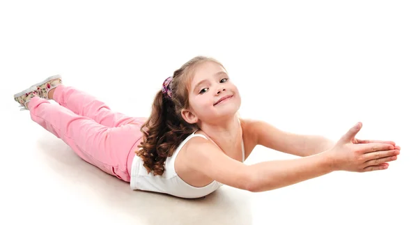 Cute little girl doing gymnastic exercise — Stock Photo, Image