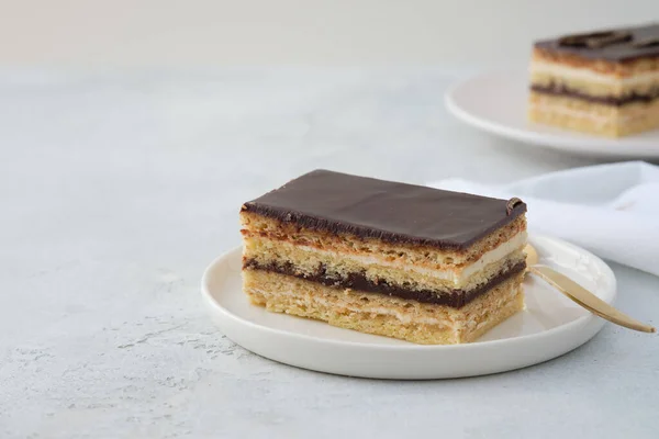 Opera cake is a type of almond sponge cake with a coffee and chocolate filling.