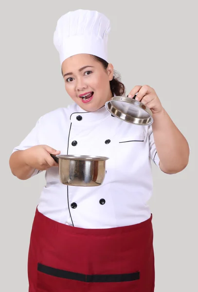 Жінка в кулінарній формі — стокове фото