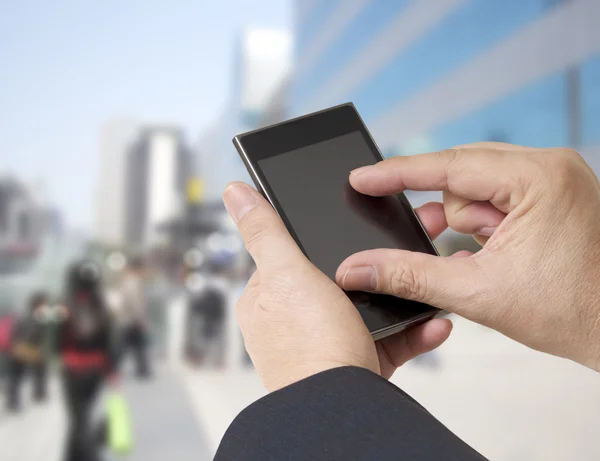 Man och mobiltelefon — Stockfoto