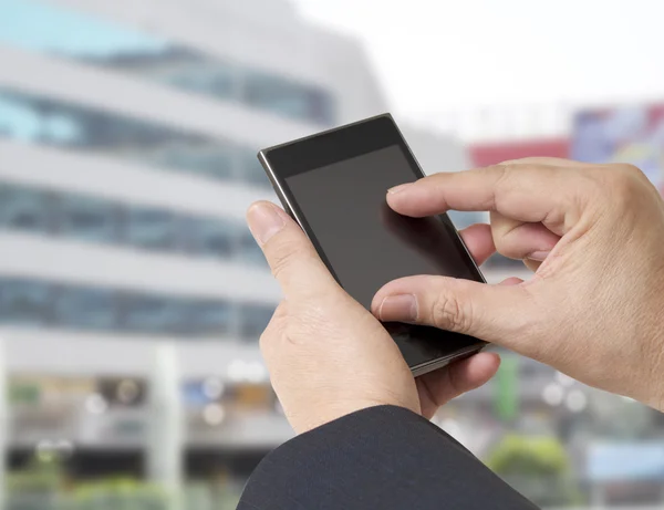 Man och mobiltelefon — Stockfoto