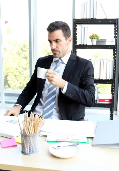 Businessman Drinking Coffee Looking Computer His Office Stock Picture