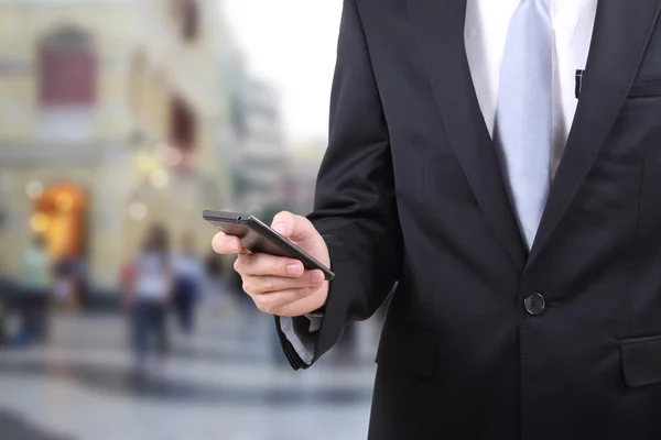 Mann berührt Handy — Stockfoto