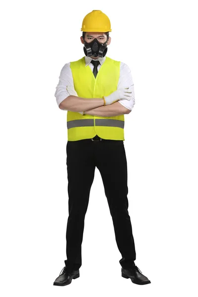 Werknemer draagt veiligheidsvest en helm — Stockfoto