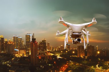 drone flying over the city clipart