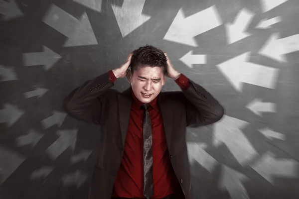 Asiatisk forretningsmand får stress - Stock-foto